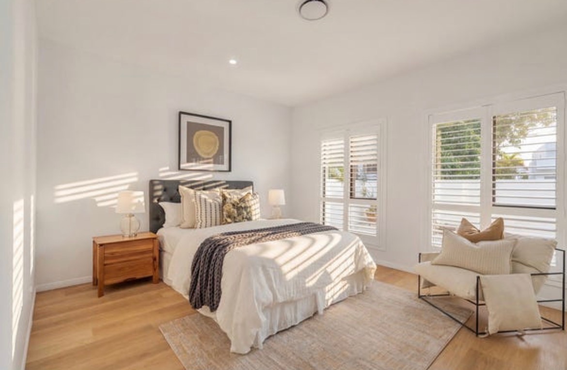 Vacant styling — white bedroom
