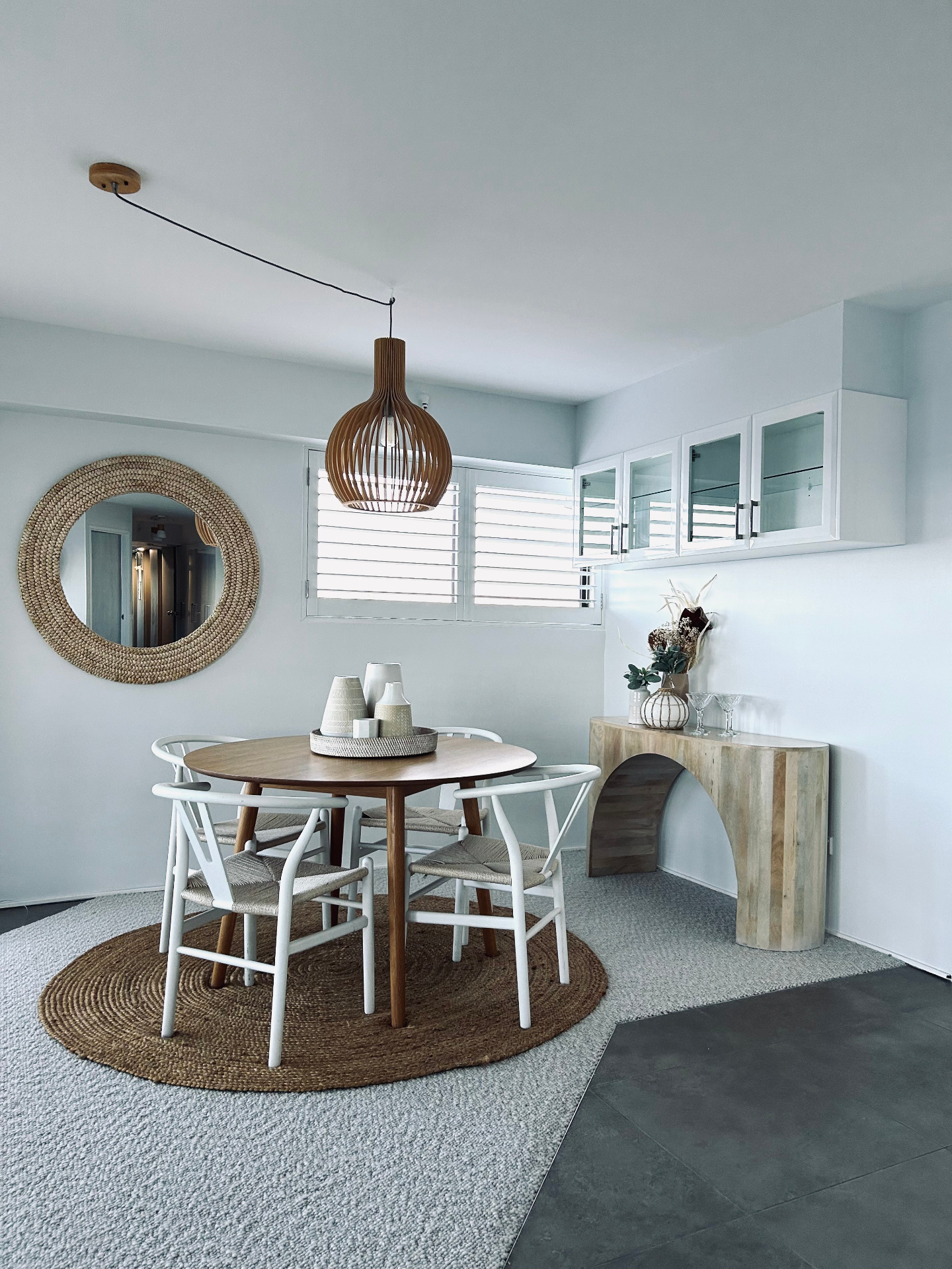 Interior design — dining nook with woven mirror