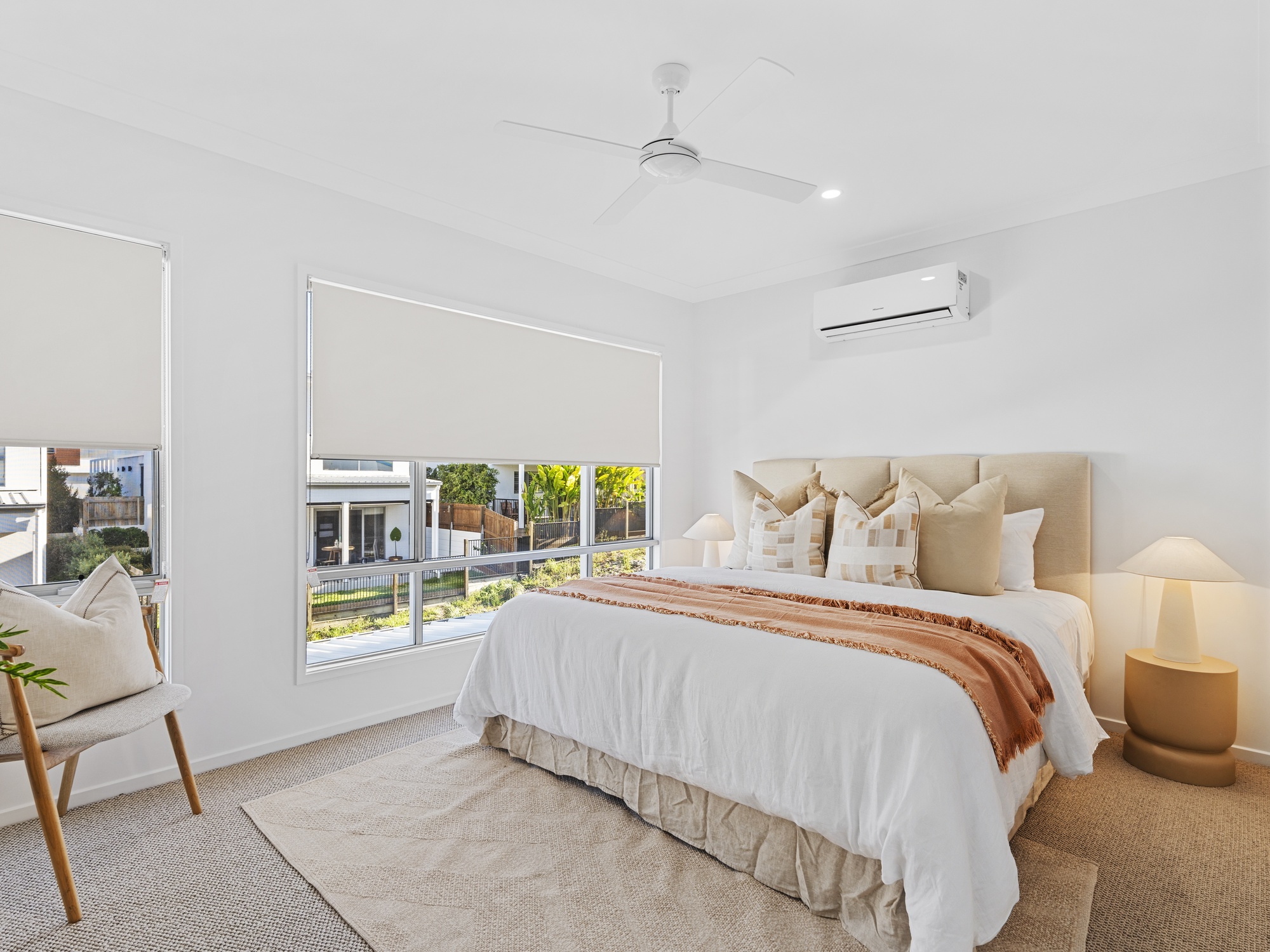 AirBNB — master bedroom with rust throw and natural tones