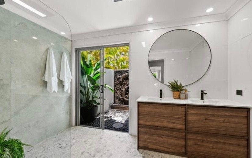 Vacant styling — bathroom with marble and timber vanity