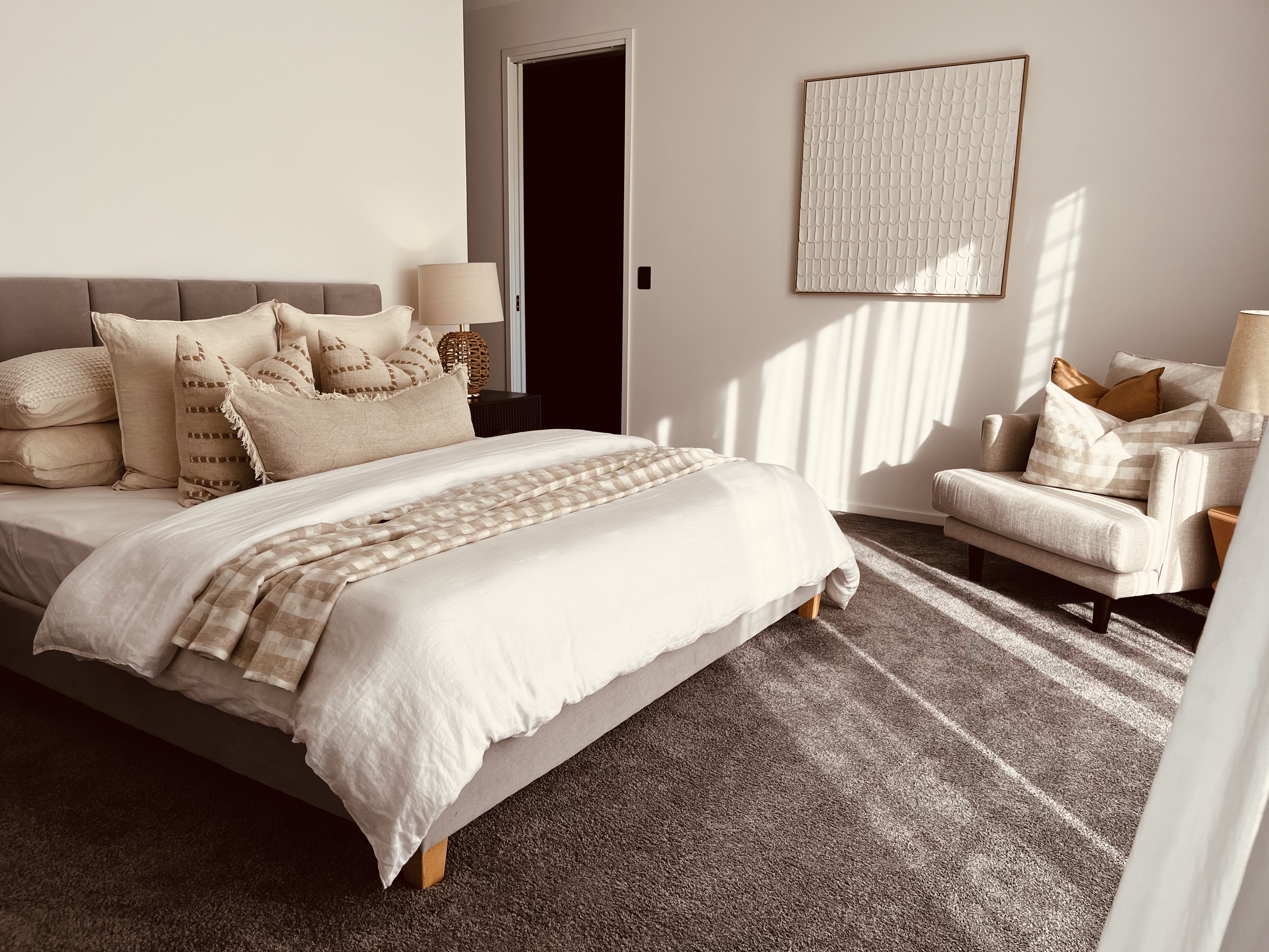 Occupied styling — warm-toned bedroom