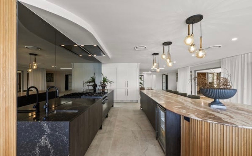 Interior design — marble kitchen with pendant lighting