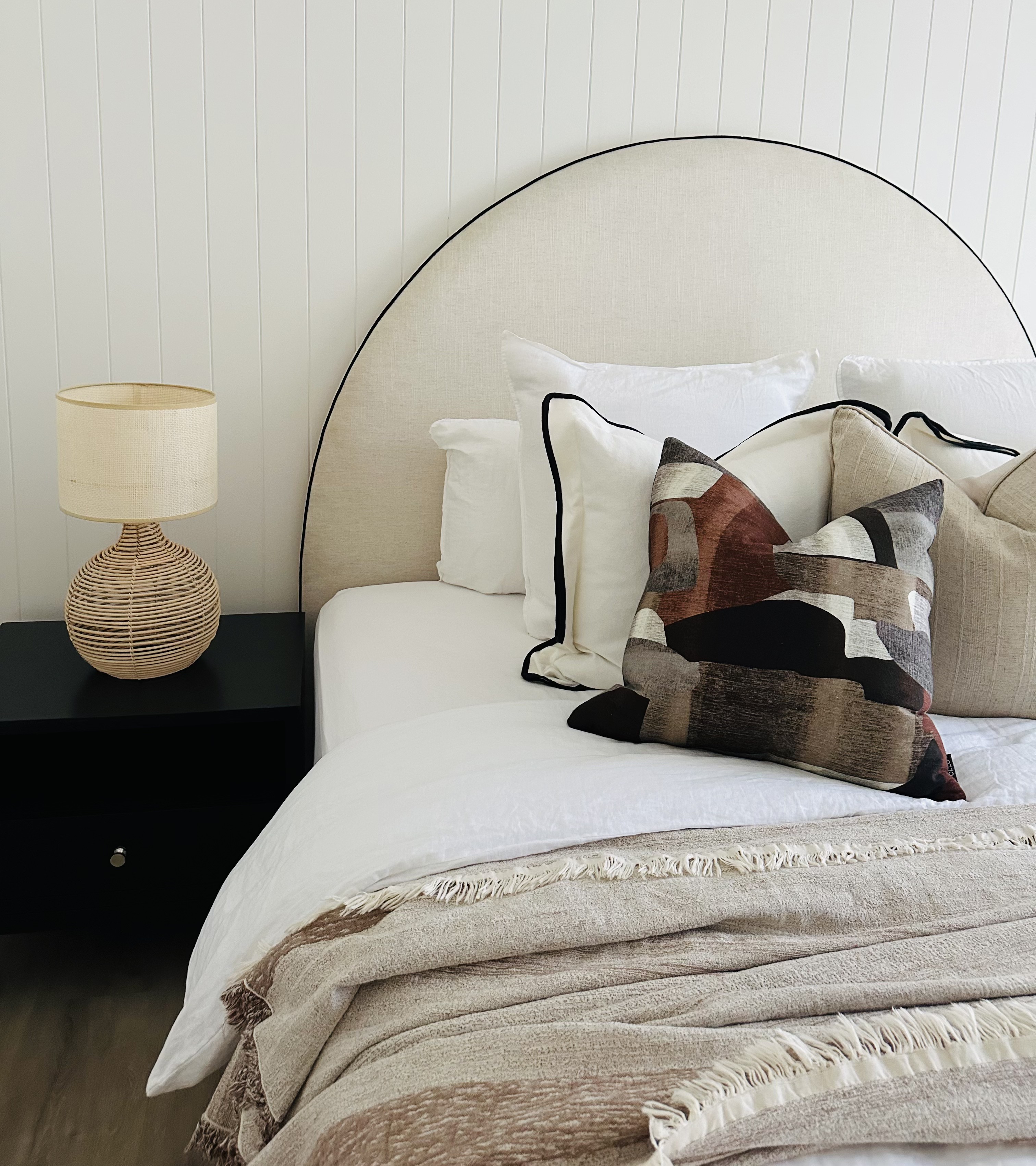 Occupied styling — arched bedhead detail
